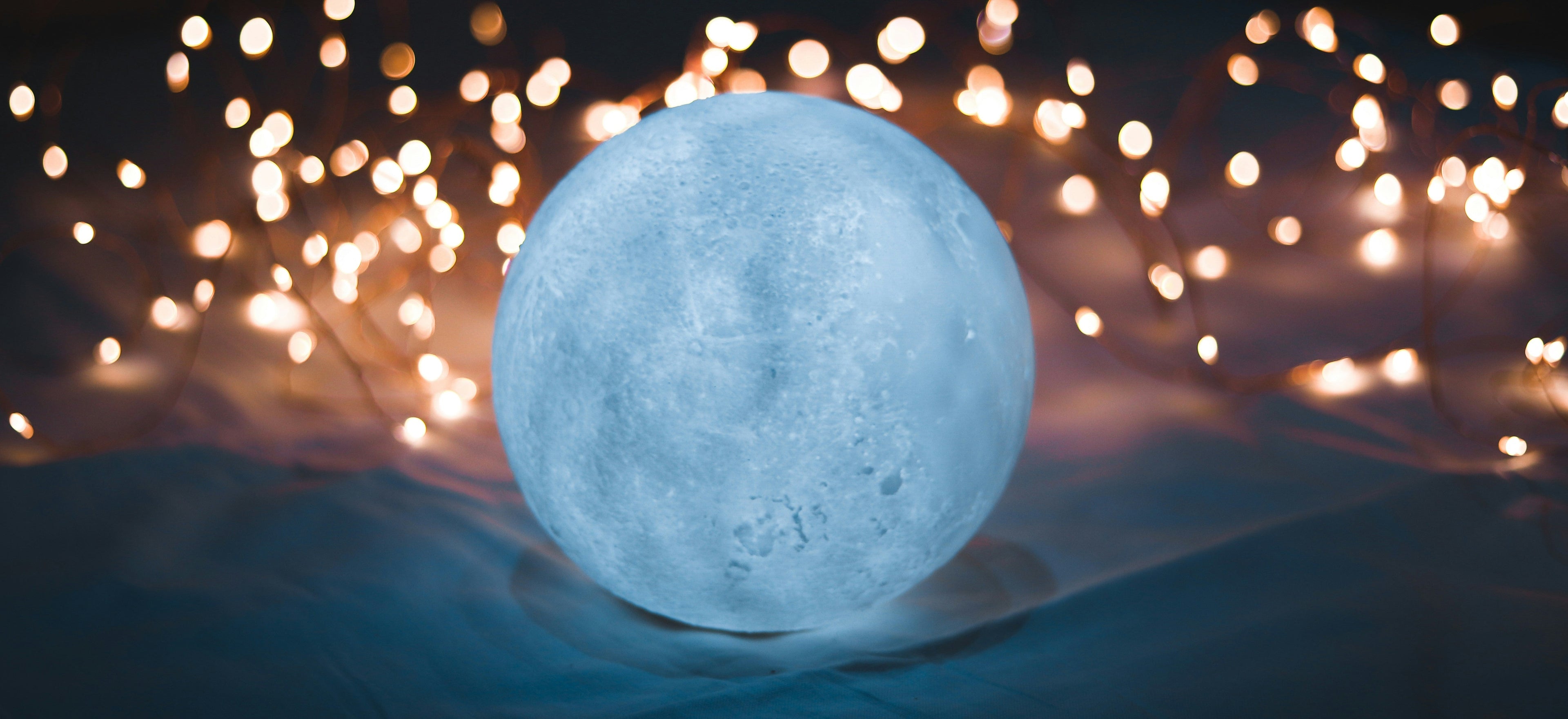 Spiritual moon image with fairy lights