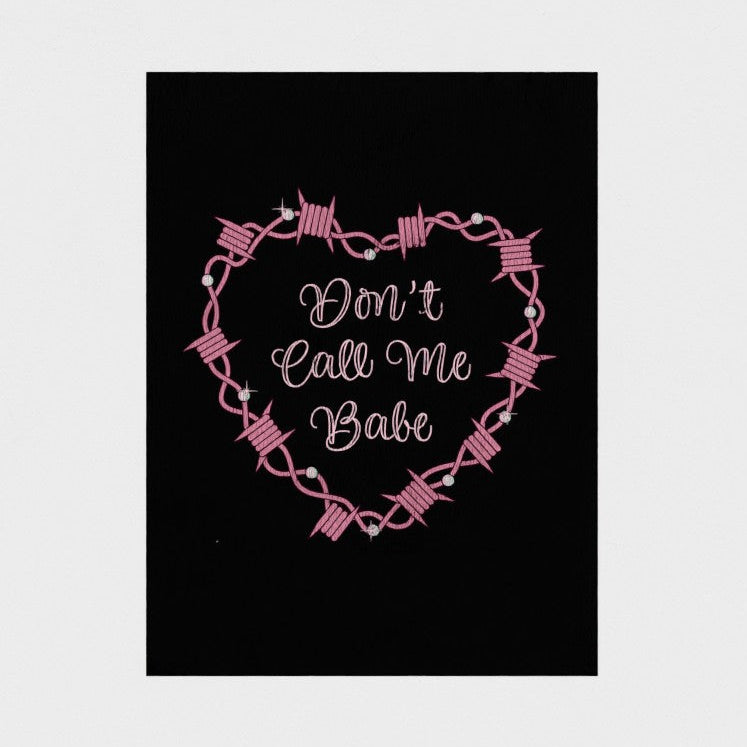 Heart-shaped barbed wire design with 'Don't Call Me Babe' text on a black background