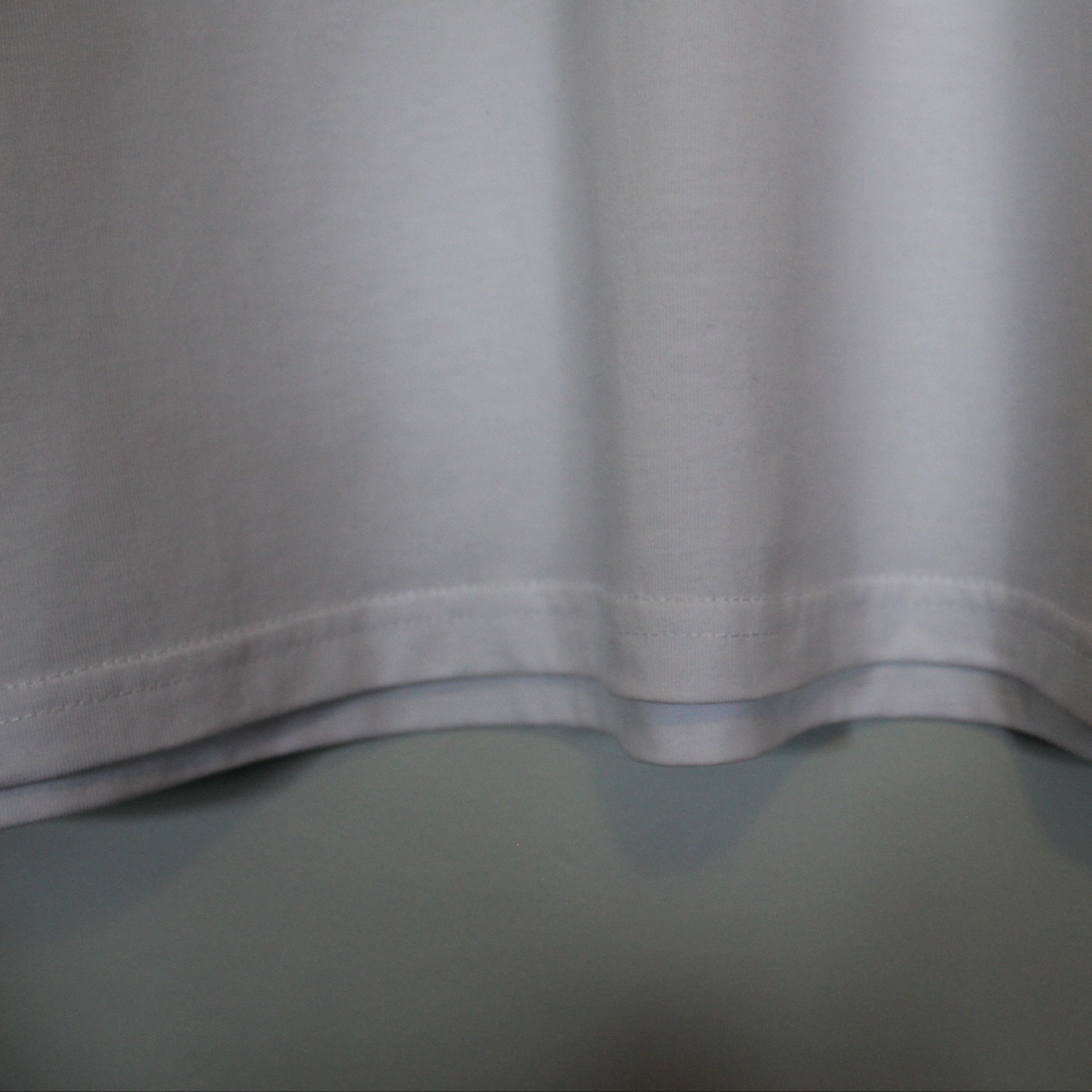 White t-shirt on a light gray background